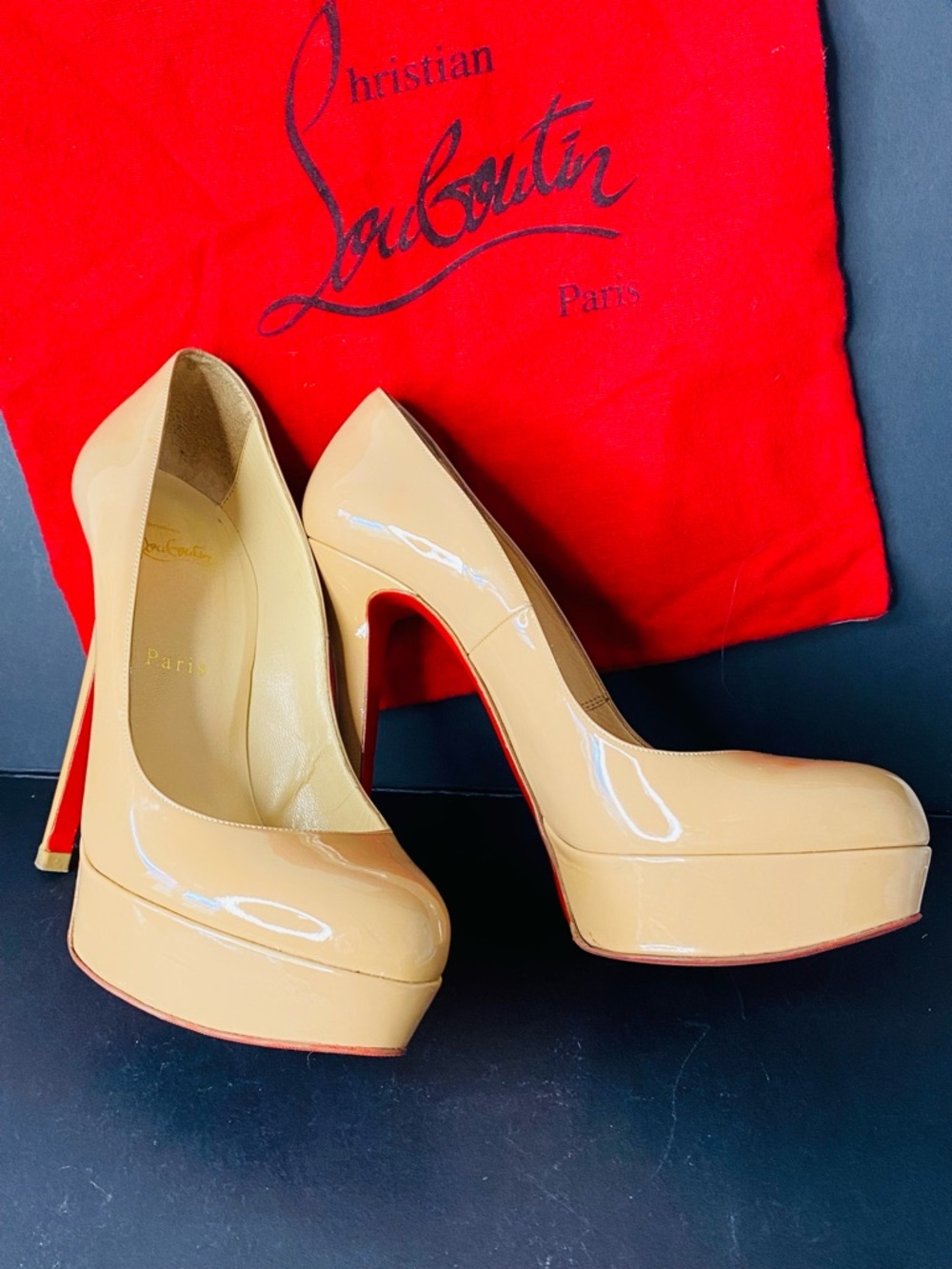 Christian Louboutin Bianca 140
Nude Patent Leather Pumps
Auth w Packaging